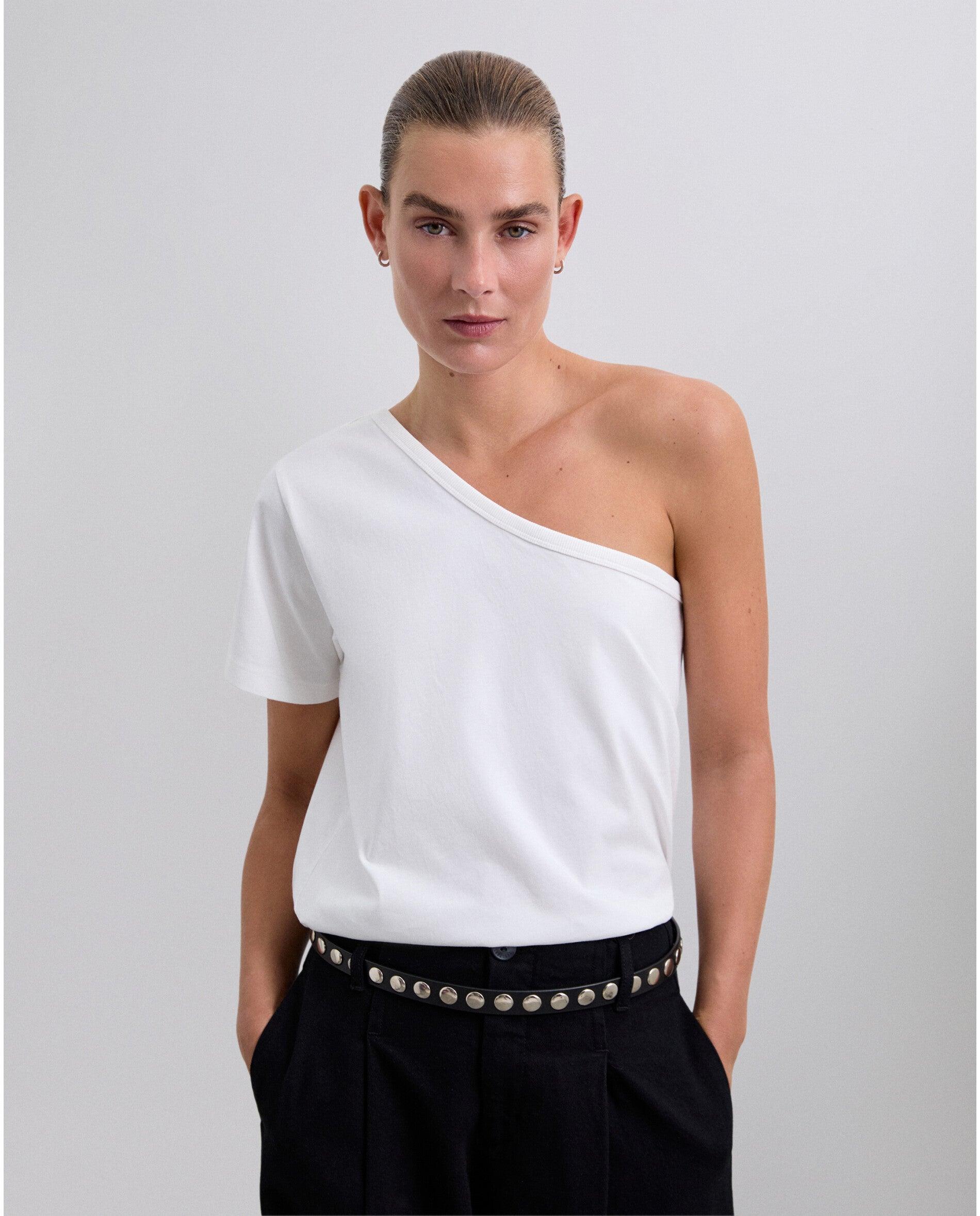 Scalpers - Camiseta de mujer de algodón con escote asimétrico.