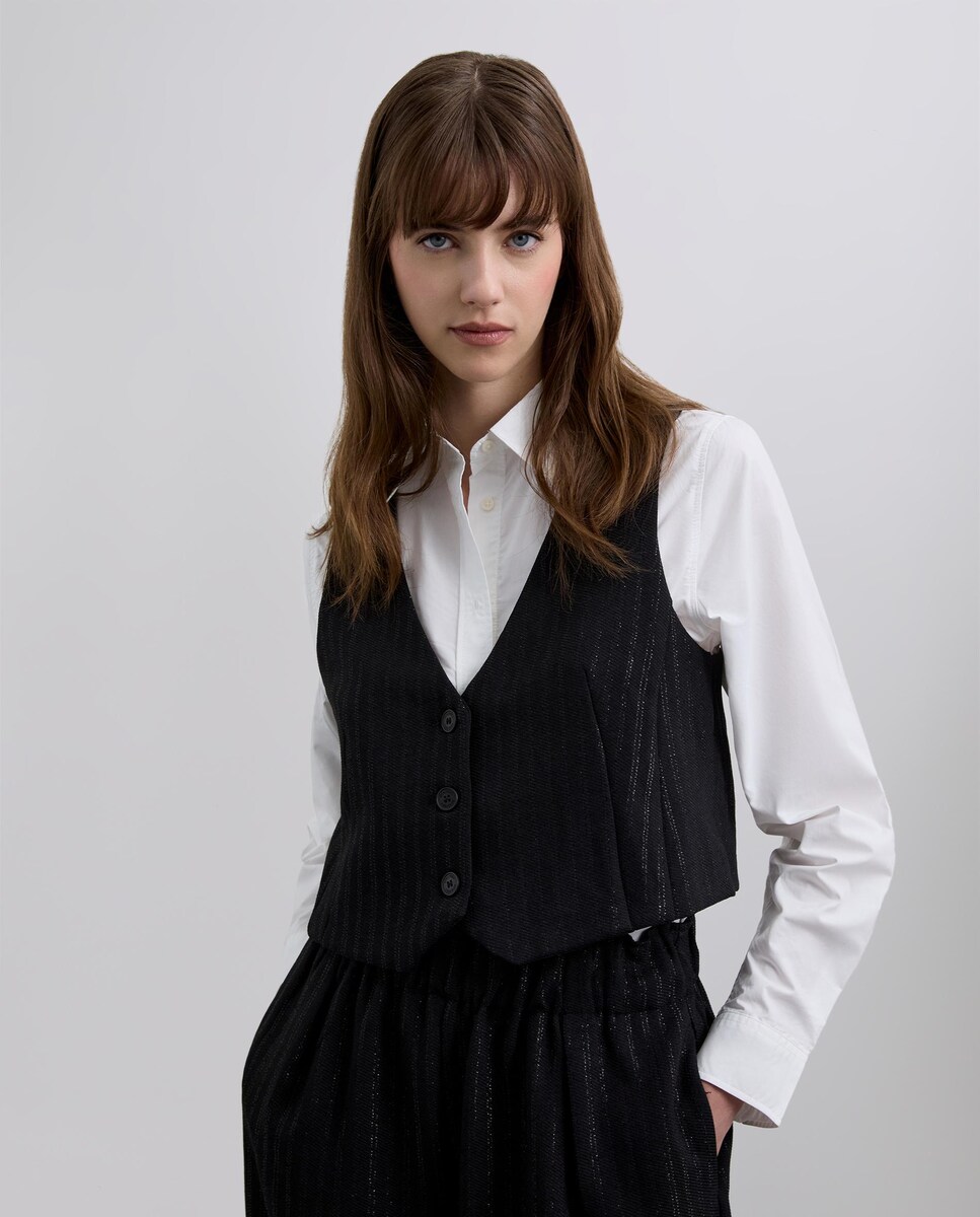 Chaleco con escote de pico y cierre de botones · Scalpers · El