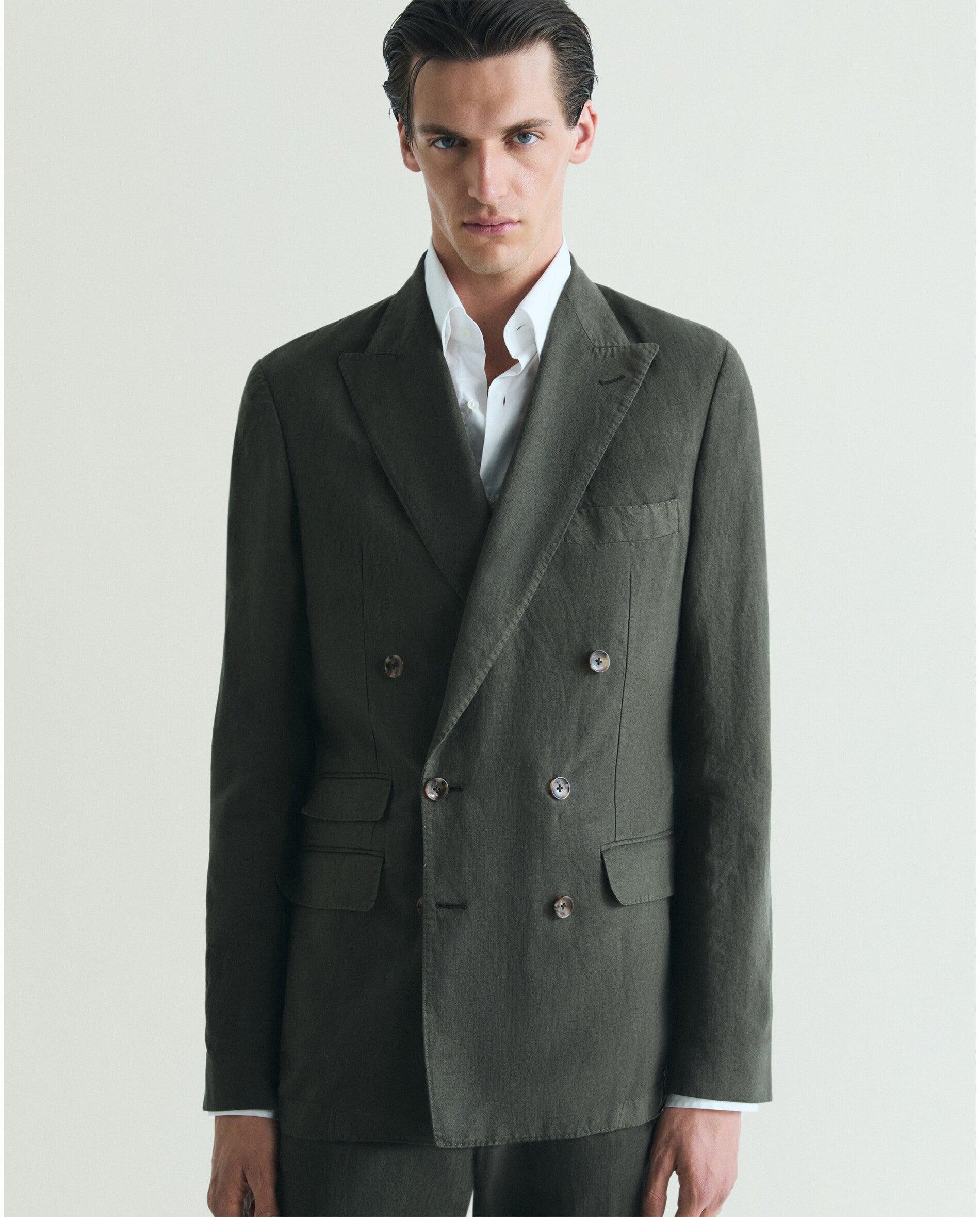 Imagen 0 de Chaqueta de traje de hombre regular fit cruzada con aberturas traseras Verde oscuro