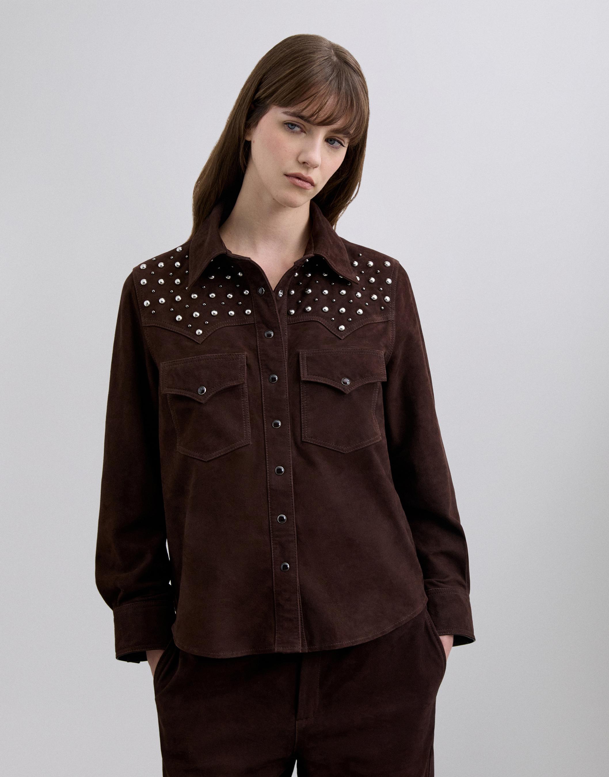 Scalpers - Sobrecamisa de mujer de piel con tachuelas.