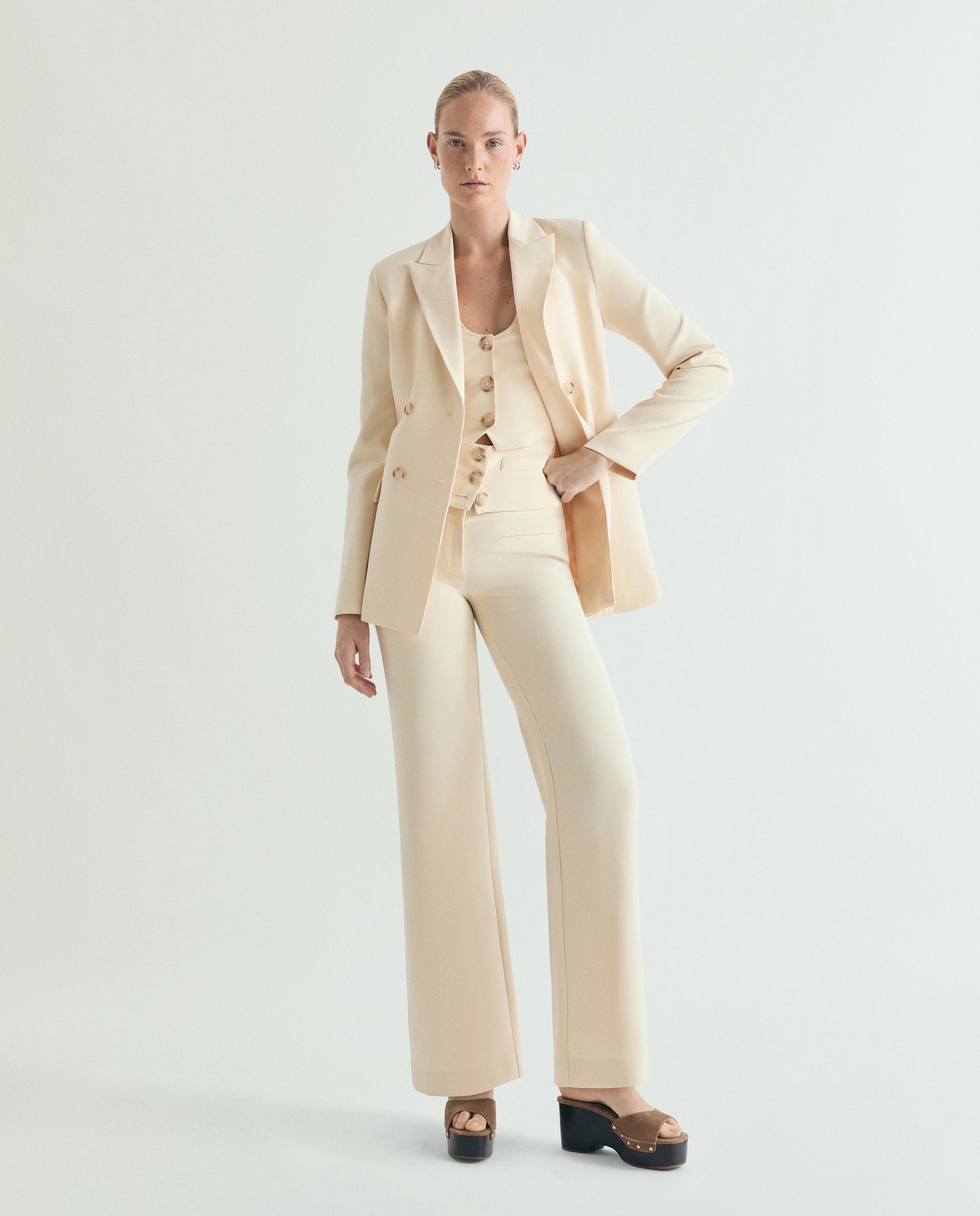Scalpers - Pantalones de vestir de mujer con bolsillos decorativos.