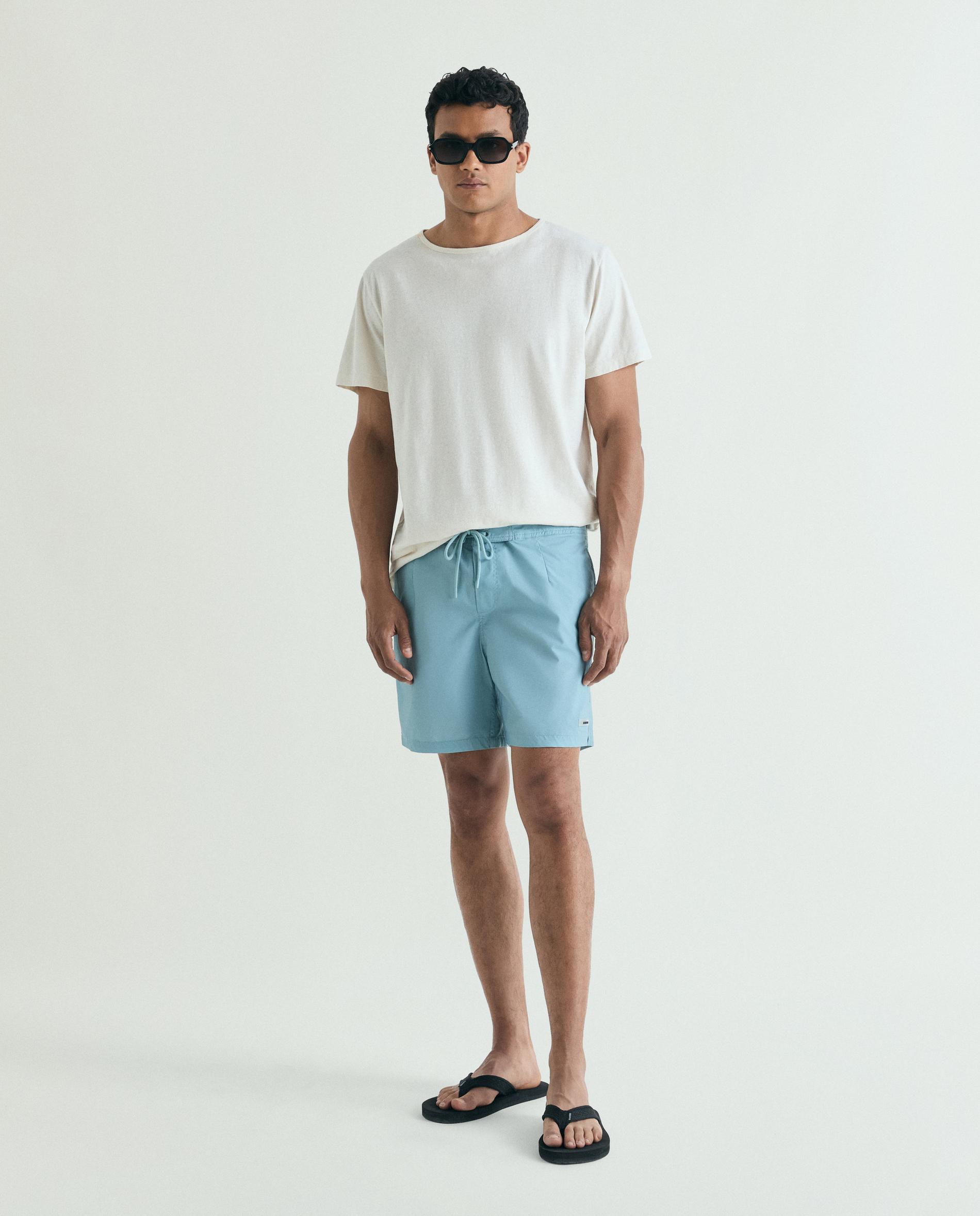 Imagen 0 de Bañador bermuda de hombre liso con bolsillo trasero Azul grisáceo