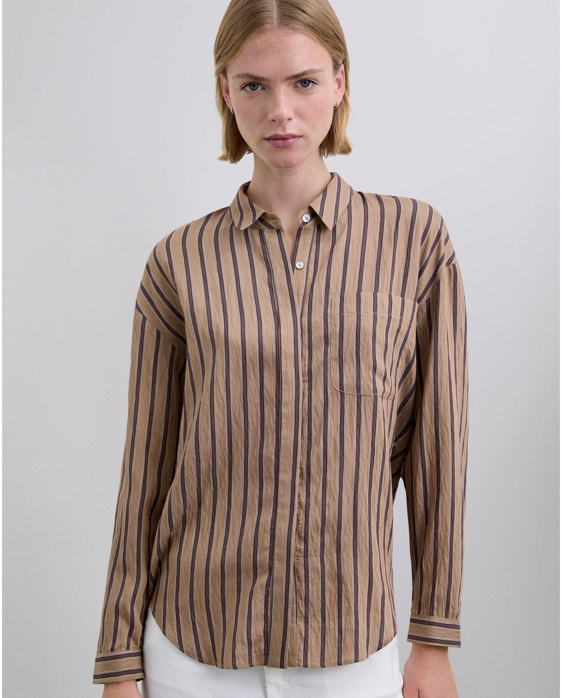 Scalpers - Camisa de mujer de rayas con bolsillo en el pecho.