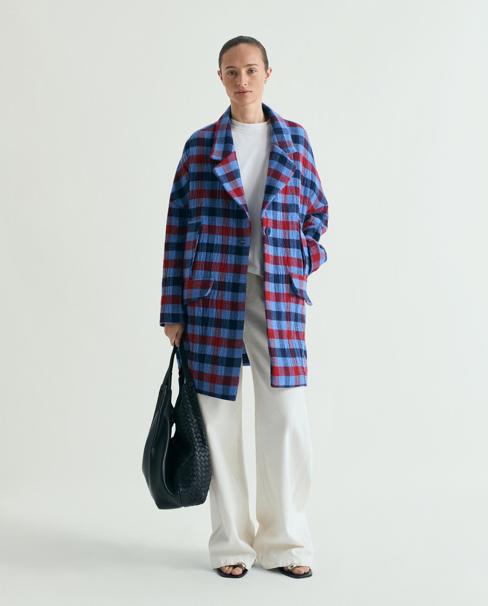 Scalpers - Abrigo de paño de mujer ligeramente oversize con botones automáticos.