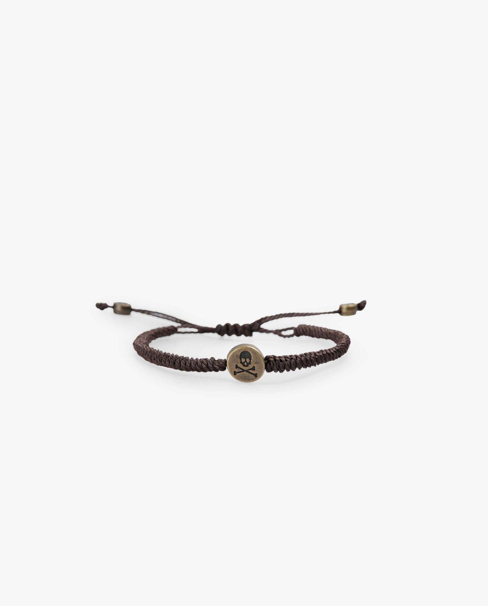 Imagen 0 de Pulsera de hombre de cordón trenzado con detalle metálico Marrón