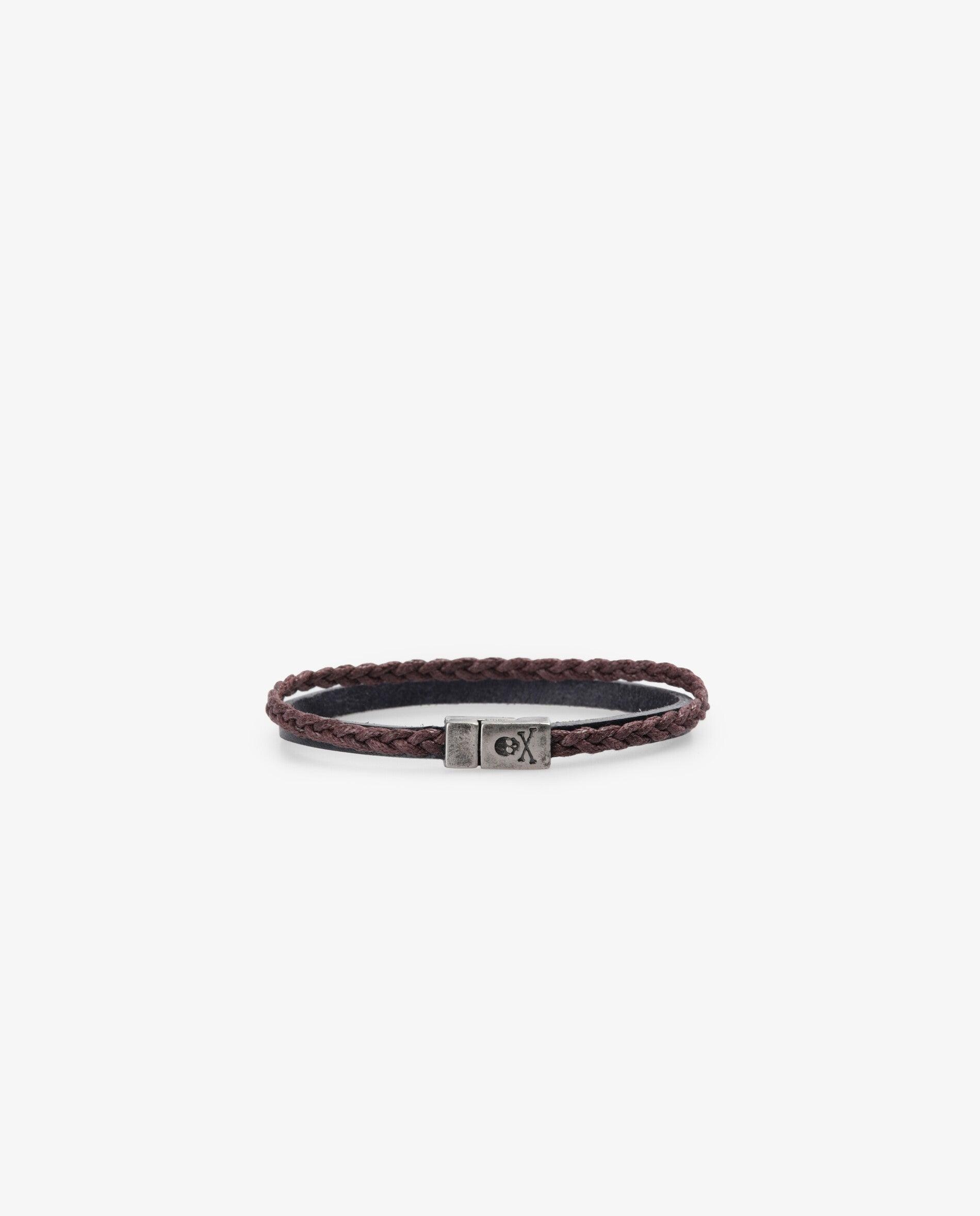 Imagen 0 de Pulsera de piel y cordón encerado con cierre metálico magnético y calavera grabada. Azul