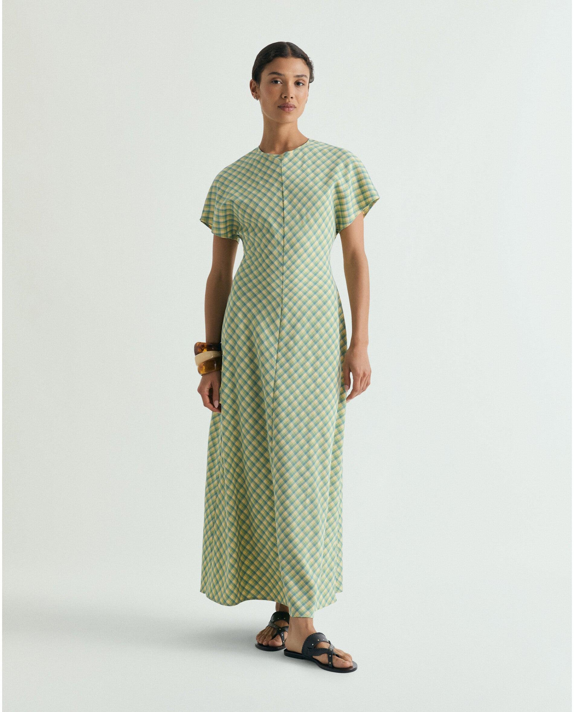 Scalpers - Vestido midi de cuadros con costura central.