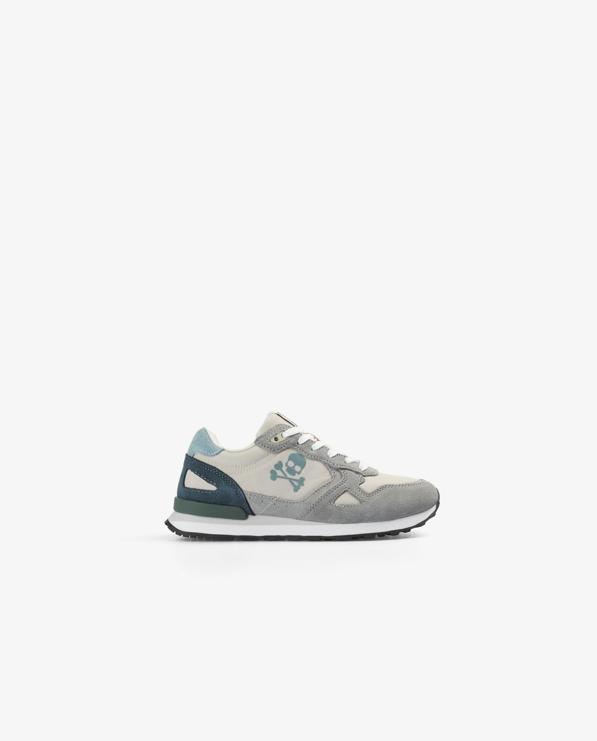 Imagen 0 de Zapatillas deportivas de niño de corte bajo con suela dentada Gris claro