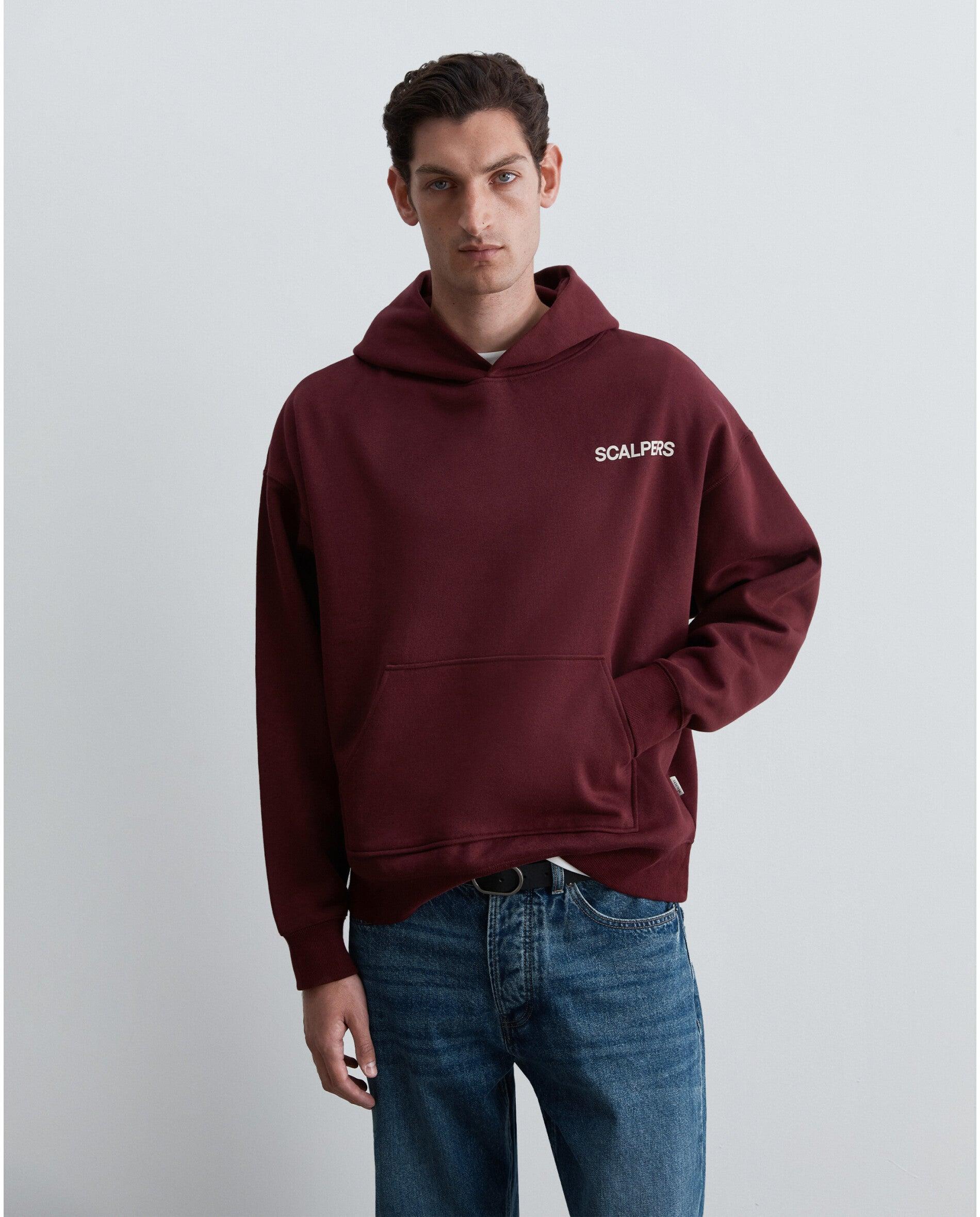 Imagen 0 de Sudadera con capucha de hombre con bolsillo canguro y letrero trasero Burdeos