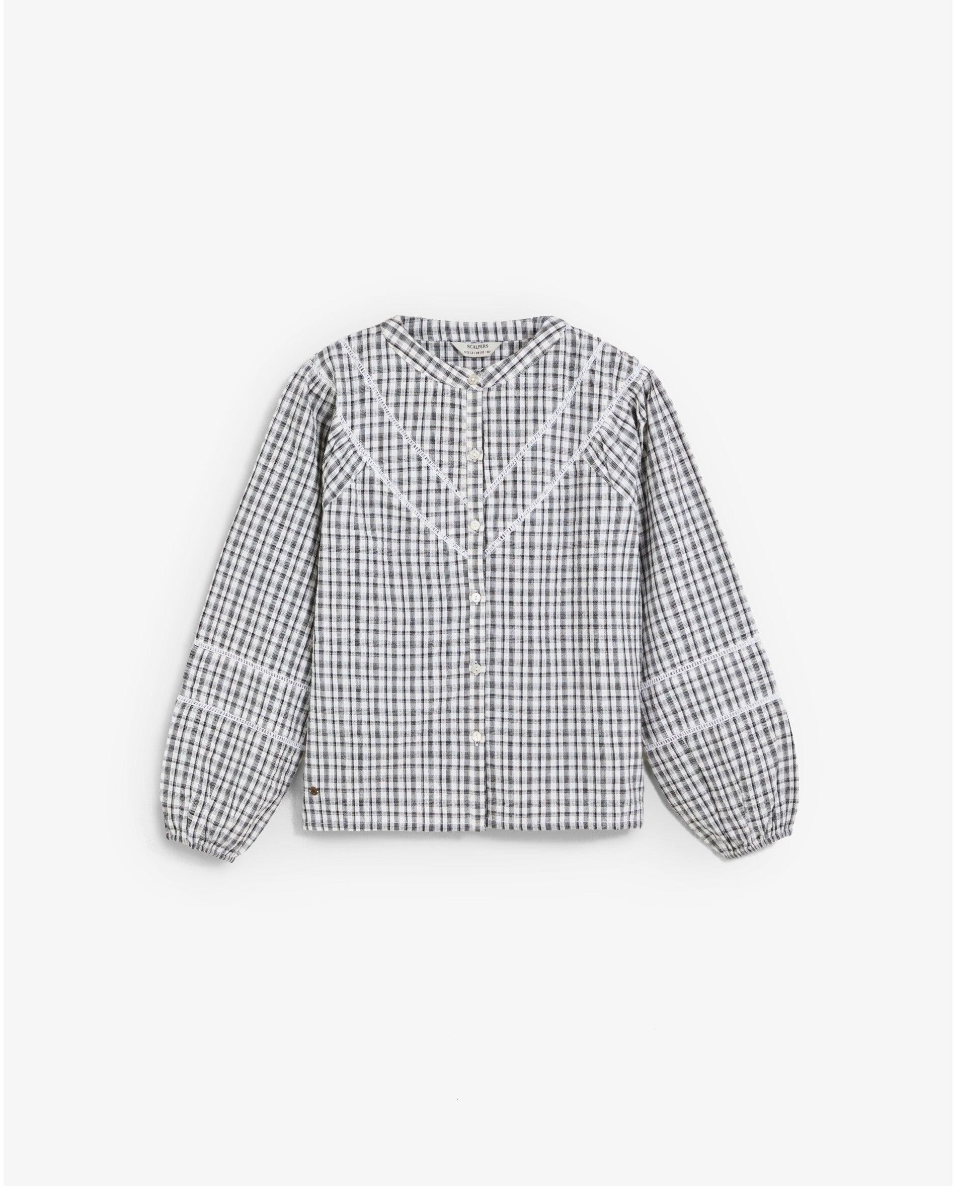 Imagen 1 de Blusa de niña con estampado de cuadros y cuello redondo Blanco / Negro