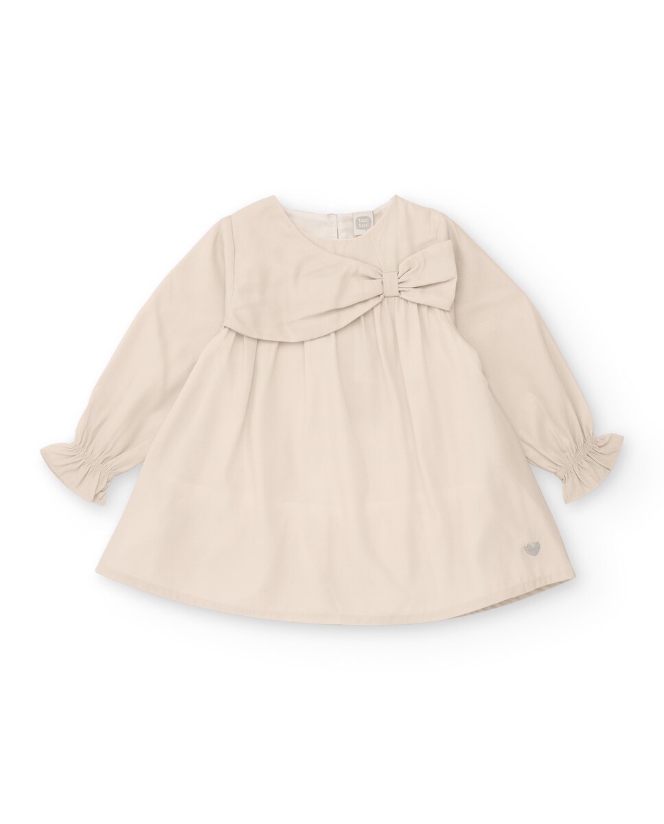 Vestido de bebé en beige con lazo decorativo · Tuc tuc · El Corte