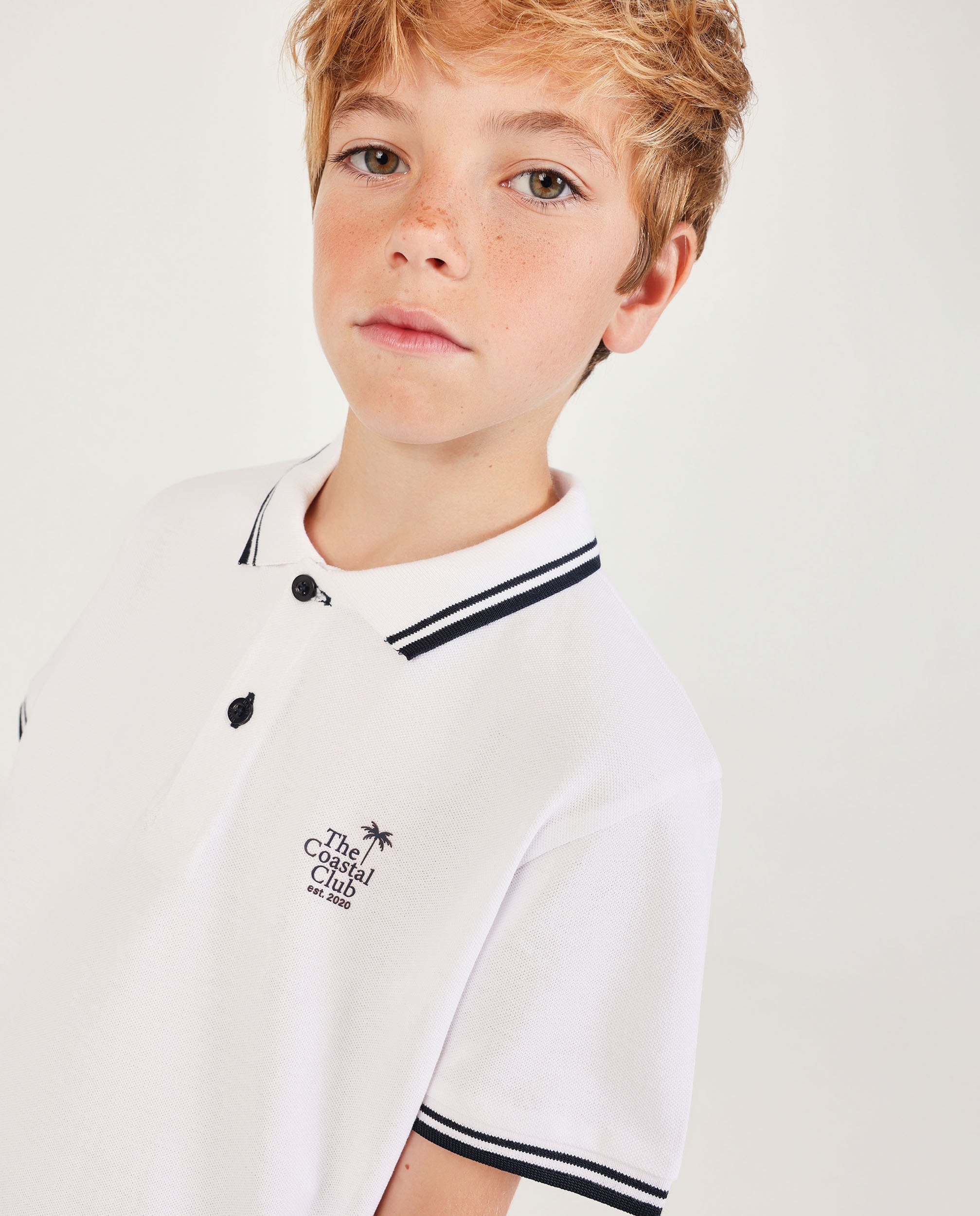 Imagen 0 de Polo de niño de punto con ribetes en contraste Blanco