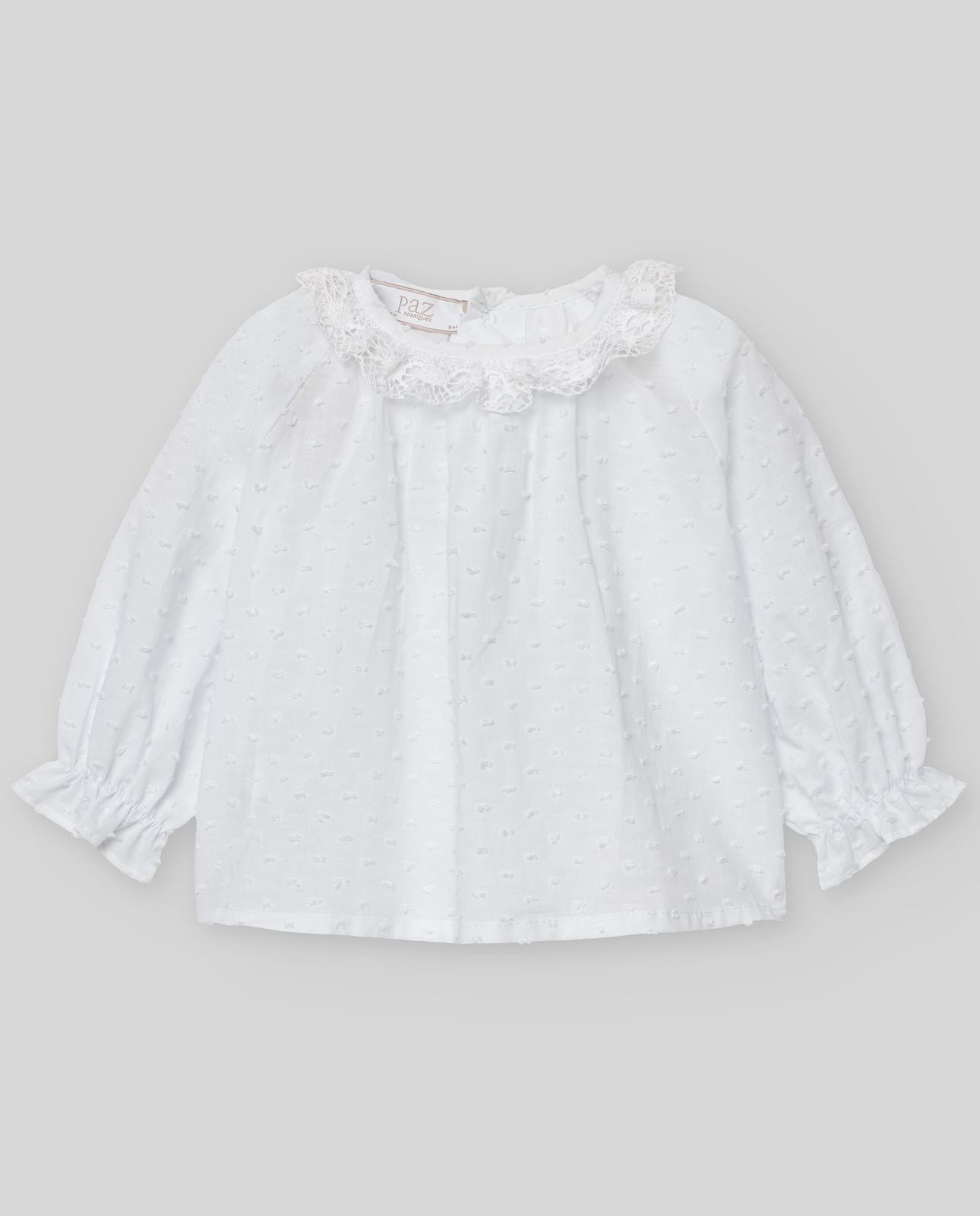 Blusa de bebé de plumeti y cuello con puntilla colección Nectar