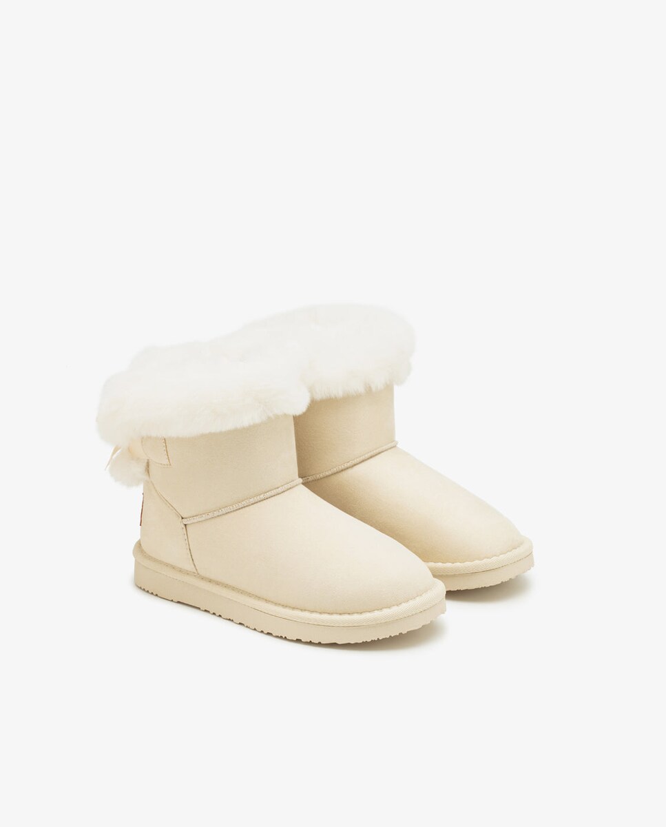 Botas de niña estilo australianas con cinturón de pelo y lazo