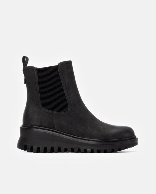 Imagen 0 de Botines de mujer con cuña y cremallera lateral