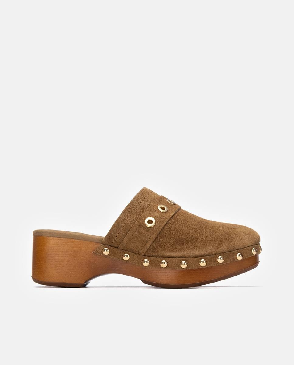 Carmela - Mules con tacón de mujer de piel con tachas.