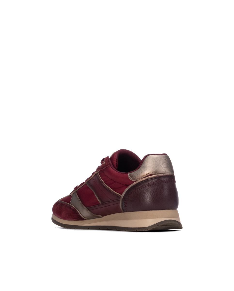Carmela - Zapatilla de mujer con cordones de piel.