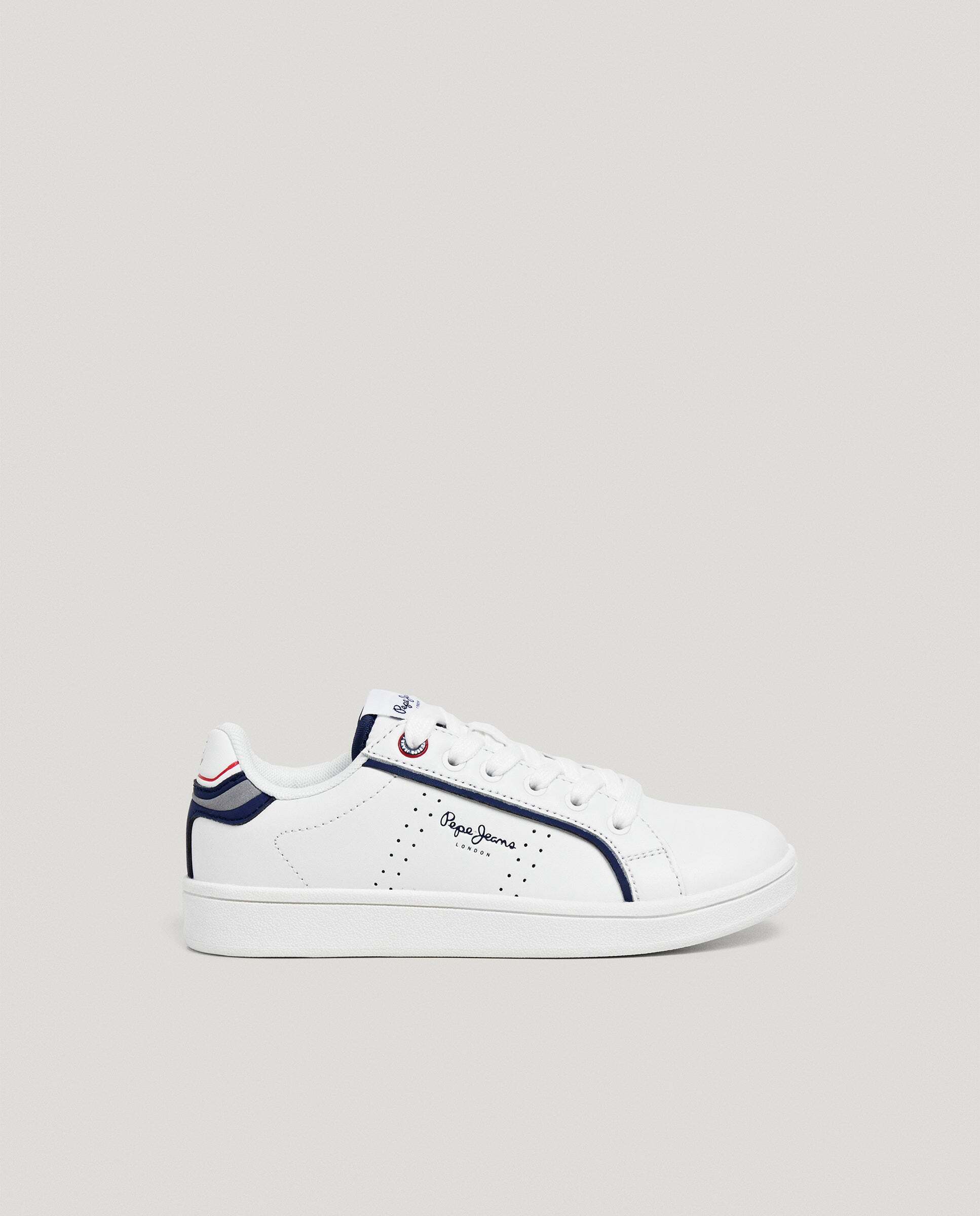 Imagen 0 de Zapatillas de niño clásicas de piel microperforadas Blanco