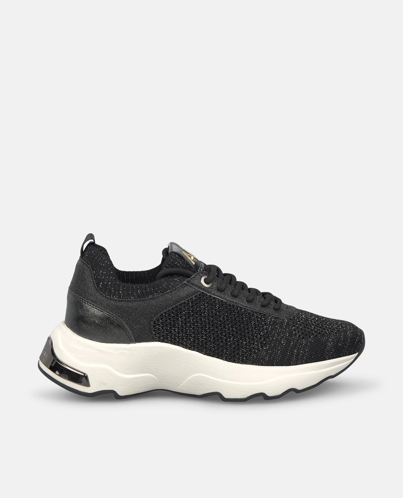 Imagen 0 de Zapatillas deportivas de mujer de piel con rejilla con tacha de pedrería Negro / Blanco